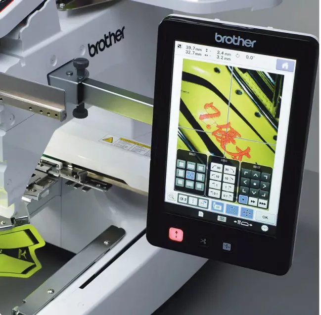 Camera function on embroidery machine shows design position